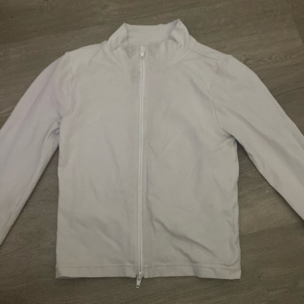 garage white zip up size small OK condition slightly off color